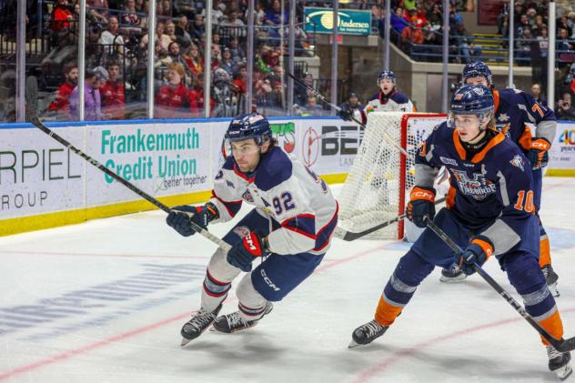 Saginaw Spirit's Nicholas Sima and Flint Firebirds' Jimmy Lombardi on game night