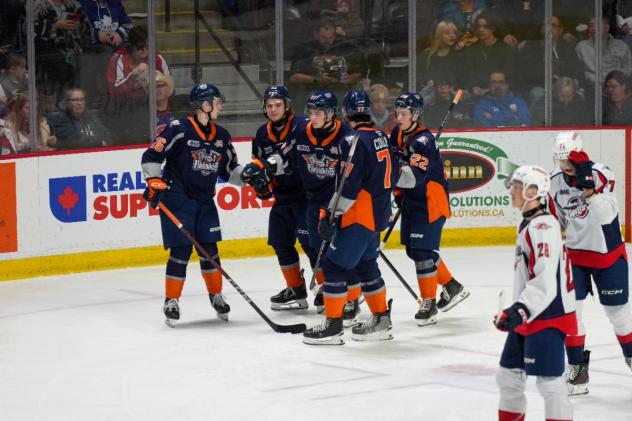 Flint Firebirds gather following a goal