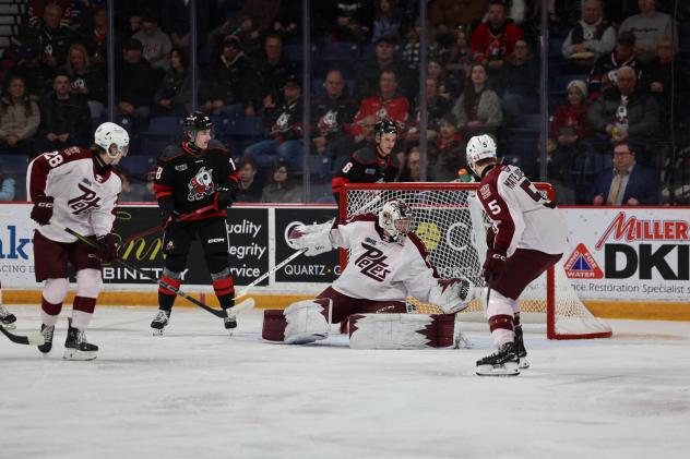 Peterborough Petes goaltender Easton Rye makes a save