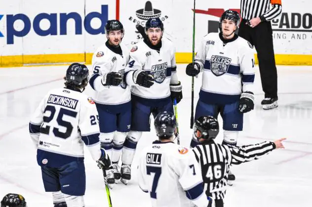 Worcester Railers discuss a penalty with the officials