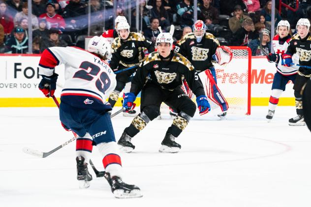 Lethbridge Hurricanes' Brayden Yager versus Spokan Chiefs' Nathan Mayes