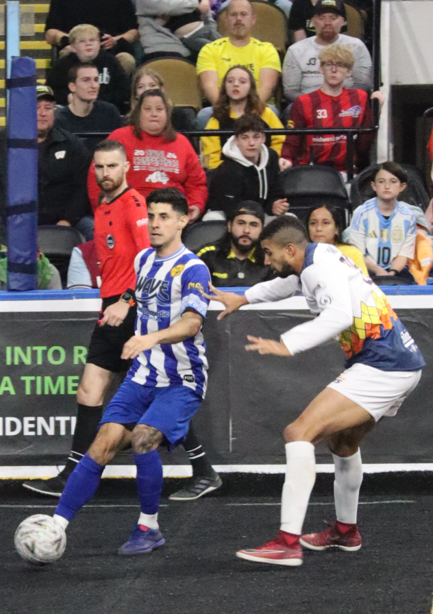 Milwaukee Waves' Mario Alvarez and Tacoma Stars' Tyler John in action