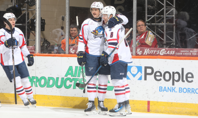 Springfield Thunderbirds' Samuel Johannesson congratulated by teammate
