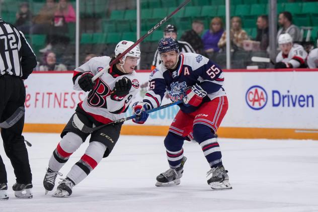 Belleville Senators left wing Angus Crookshank (left) vs. the Hartford Wolf Pack
