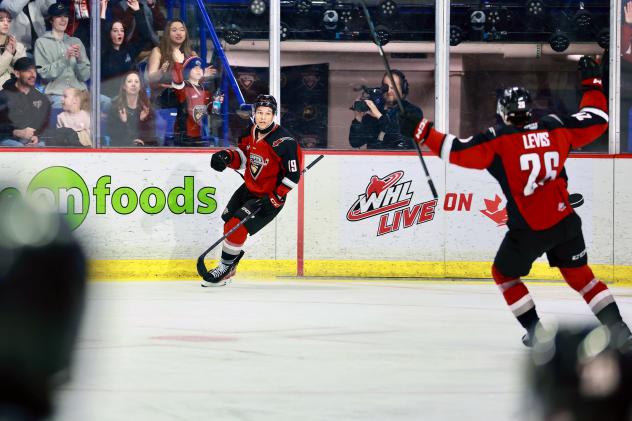 Vancouver Giants react following a goal