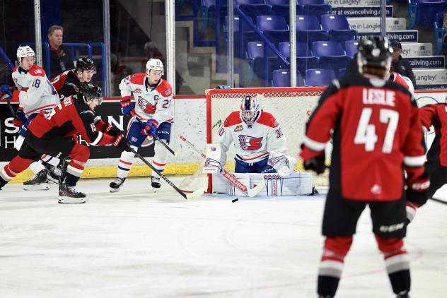 Vancouver Giants pressure the Spokane Chiefs' net