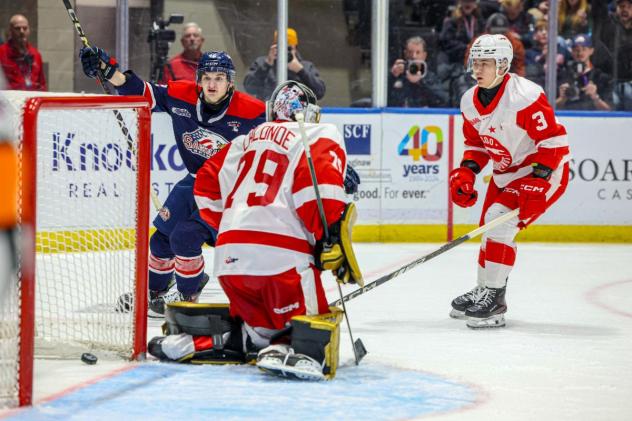Saginaw Spirit forward Jacob Cloutier scores against the Soo Greyhounds