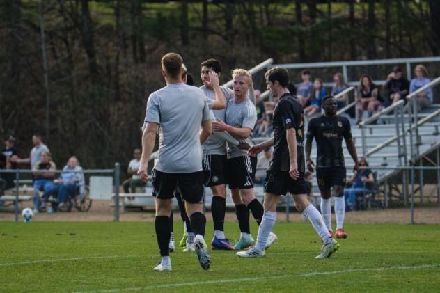 Chattanooga FC exchanges high fives after a goal against the Birmingham Legion
