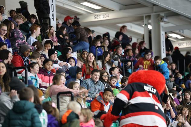 Students watch the Belleville Senators open practice