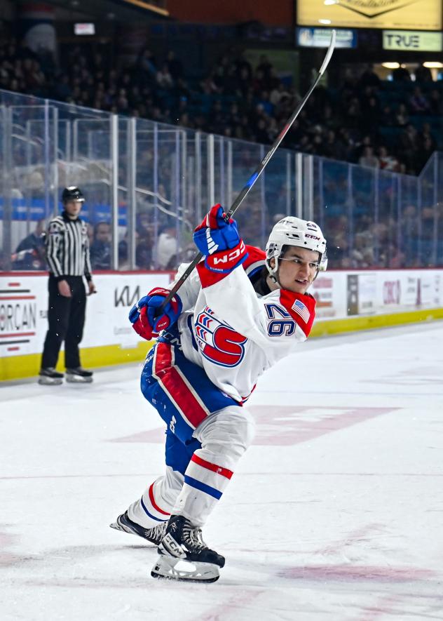 Chase Harrington of the Spokane Chiefs follows through on his shot