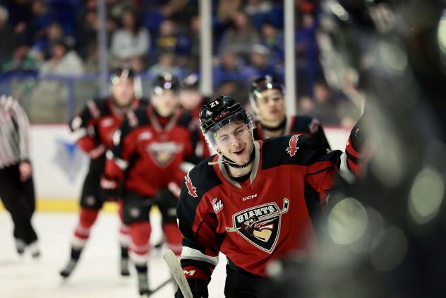 Vancouver Giants right wing Tyus Sparks (center) vs. the Prince George Cougars