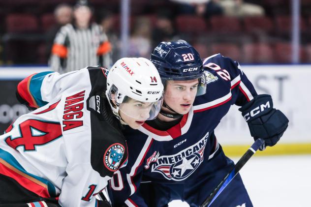 Kalder Varga of the Kelowna Rockets faces off with the Tri-City Americans