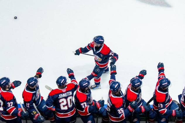 Saginaw Spirit right wing Dimian Zhilkin is saluted by teammates
