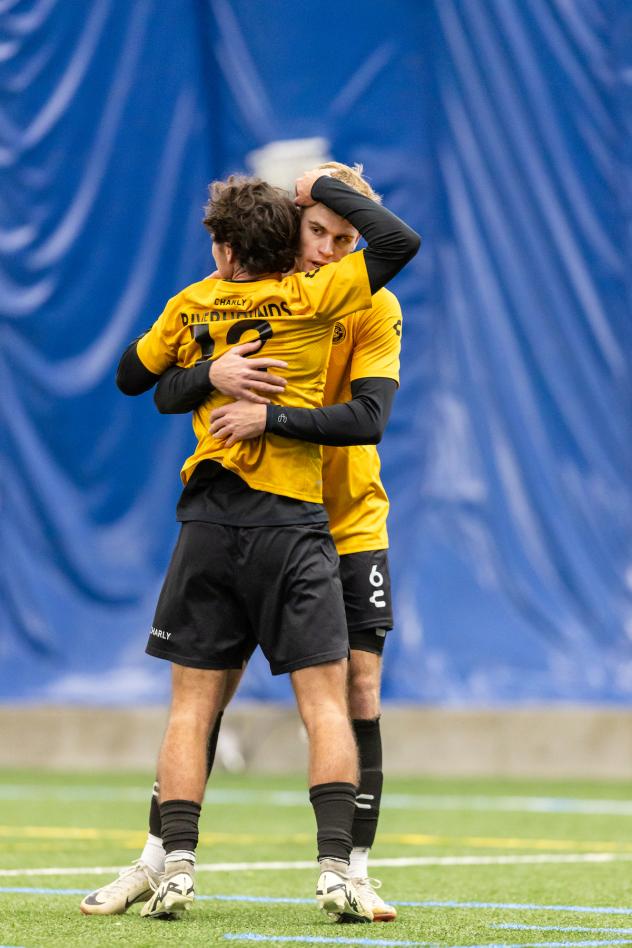 Pittsburgh Riverhounds SC defender Max Broughton and midfielder Charles Ahl celebrate