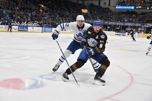 Toronto Marlies' Cade Webber versus Syracuse Crunch's Gabriel Fortier