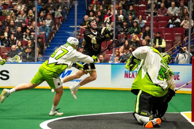 Vancouver Warriors' Marcus Klarich versus Saskatchewan Rush's Keegan Bell and Frank Scigliano
