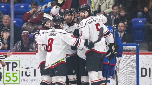 Adirondack Thunder gather after a goal