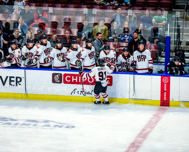 Rapid City Rush forward Blake Bennett received congratulations along the bench