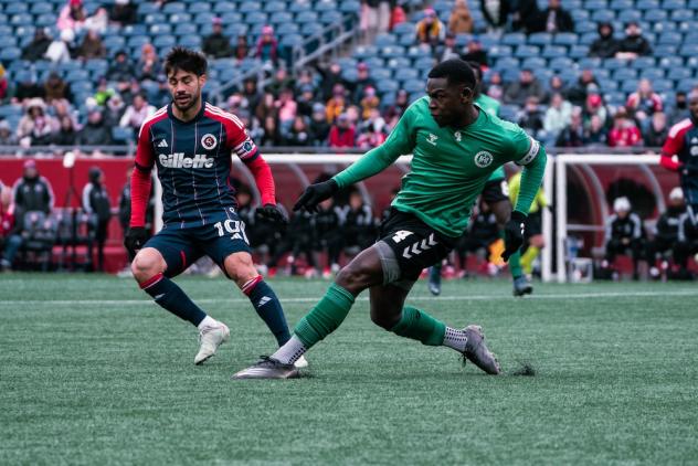 Hartford Athletic defender Jordan Scarlett (right)