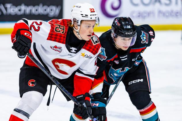 Kalder Varga of the Kelowna Rockets (right) vs. the Prince George Cougars