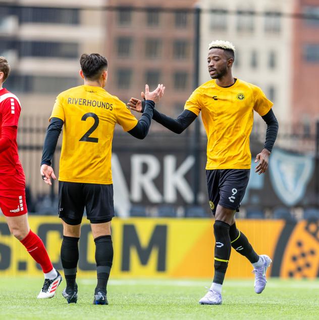 Augi Williams celebres his goal with Danny Griffin of Pittsburgh Riverhounds SC