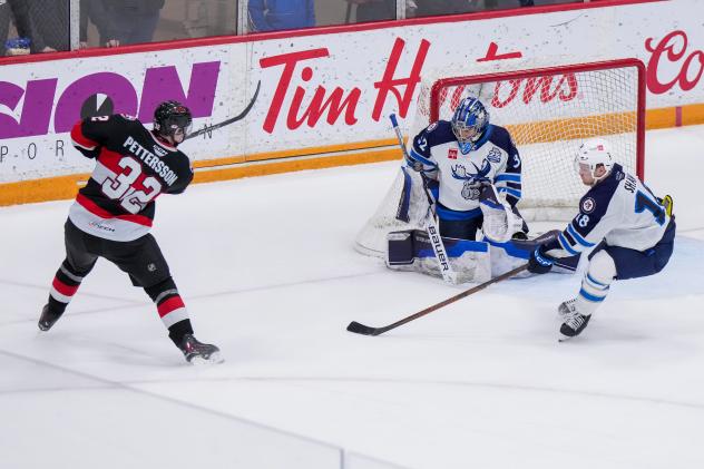 Belleville Senators right wing Oskar Pettersson launches a shot against the Manitoba Moose