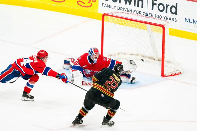 Tyler Thorpe of the Vancouver Giants scores against the Spokane Chiefs