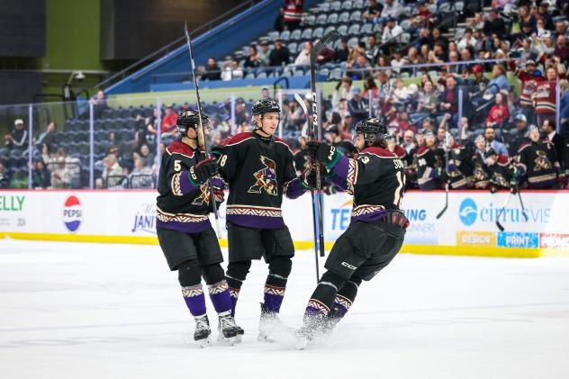 Tucson Roadrunners' Robbie Russo, Artem Duda, and Yegor Sokolov on game night