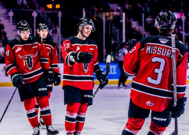 Red Deer Rebels exchange fist bumps