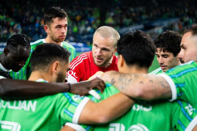 Sounders FC huddle