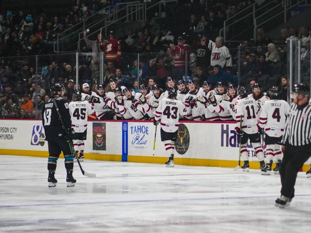 Rapid City Rush's Luke Mylymok and Parker Bowman congratulated by team
