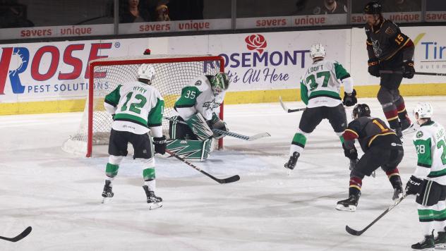 Texas Stars goaltender Magnus Hellberg stops a Chicago Wolves' shot