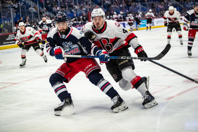 Belleville Senators defenceman Jeremy Davies (right) vs. the Hartford Wolf Pack