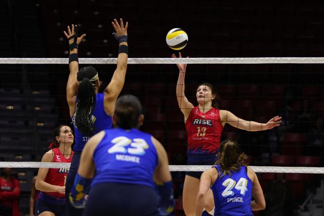 Grand Rapids Rise outside hitter Paige Briggs-Romine goes up high