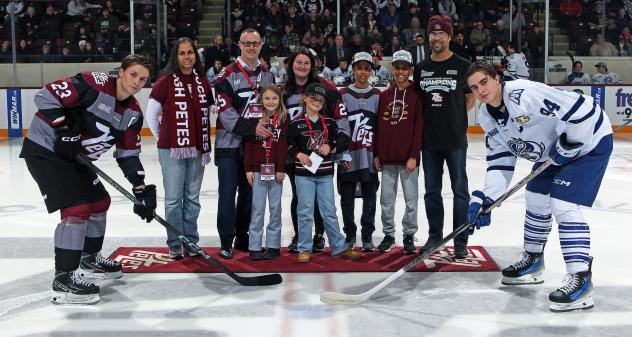 Puck drop between the Peterborough Petes and Brampton Steelheads