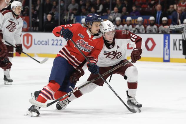 Peterborough Petes defenceman Carson Cameron (right)