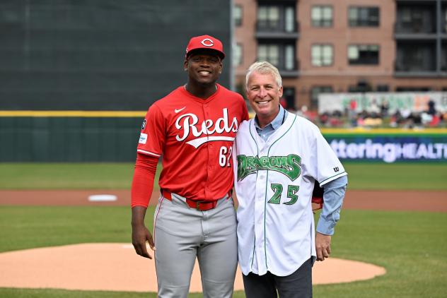 Peter Freund, CEO Of Diamond Baseball Holdings, throws out the ceremonial first pitch at Dayton Dragons-CincinnatiReds Game