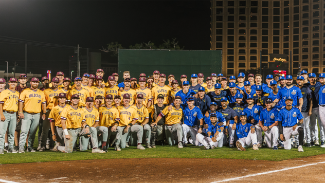 Biloxi Shuckers pose with the Pearl River Community College Wildcats