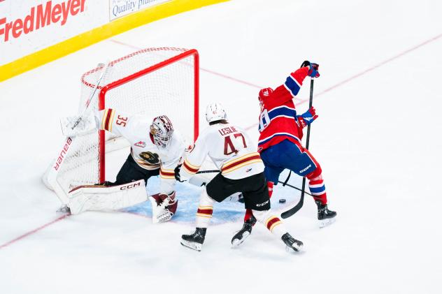 Vancouver Giants goaltender Burke Hood faces pressure from the Spokane Chiefs