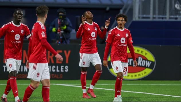 Phoenix Rising reacts after a goal