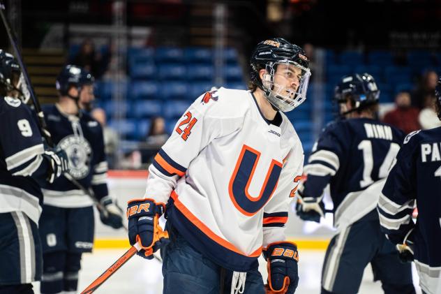Forward Jakob Breault with Utica University