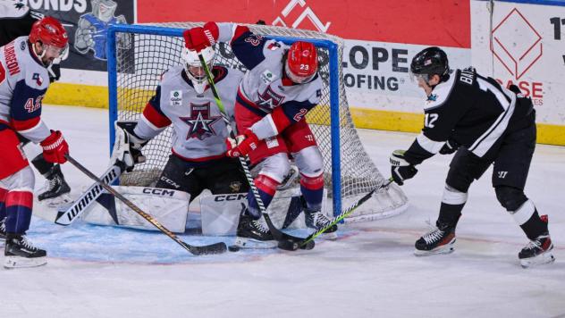 Wichita Thunder forward Peter Bates tries to poke one home vs. the Allen Americans
