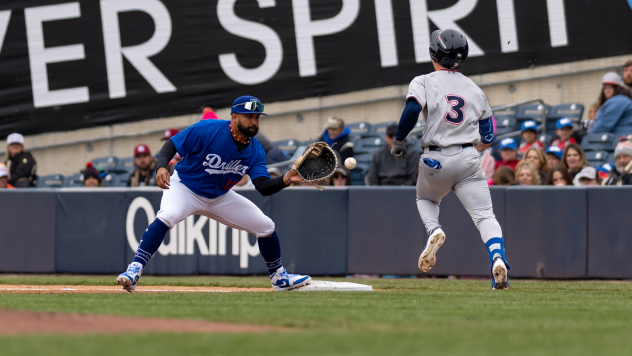 Tulsa Drillers first baseman Aaron Bracho catches the ball to record an out