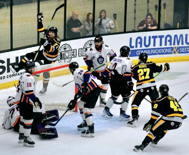 Wheeling Nailers defenseman Mats Lindgren (top left) reacts after his goal