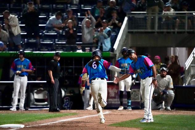 Pensacola Blue Wahoos outfielder Shane Sasaki heads home