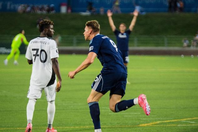 Crown Legacy's Emmanuel Uchegbu and Chattanooga FC's Peter Plougmand