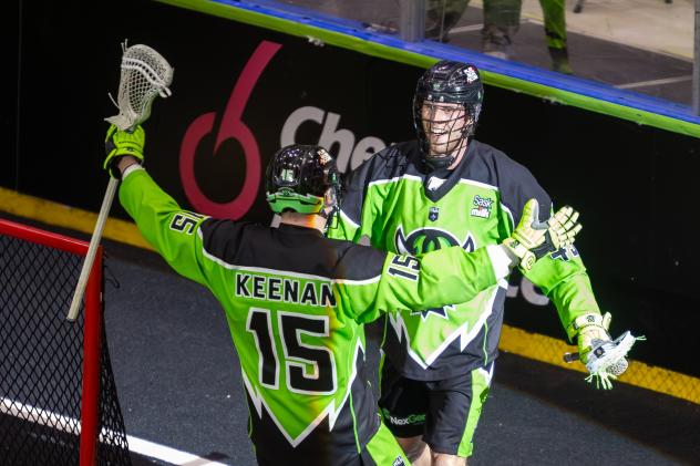 Saskatchewan Rush's Ryan Keenan congratulates teammate