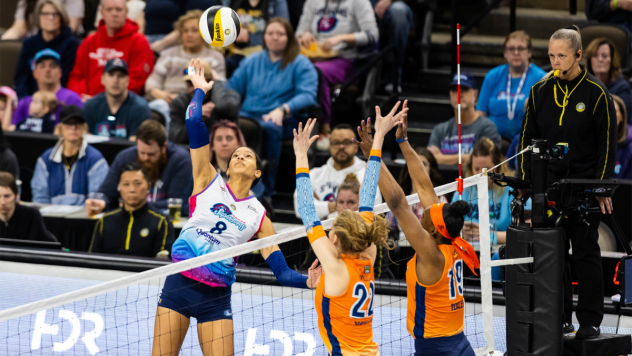 Omaha Supernovas outside hitter Reagan Cooper (left)
