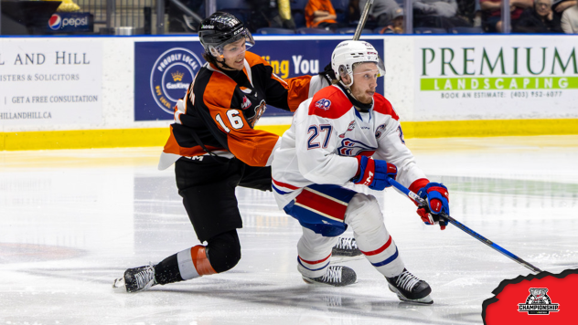 Medicine Hat Tigers' Hunter St. Martin versus Spokane Chiefs' Berkly Catton