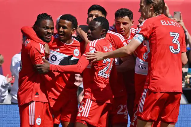 Chicago Fire FC exchanges congratulations after a goal against Atlanta United FC